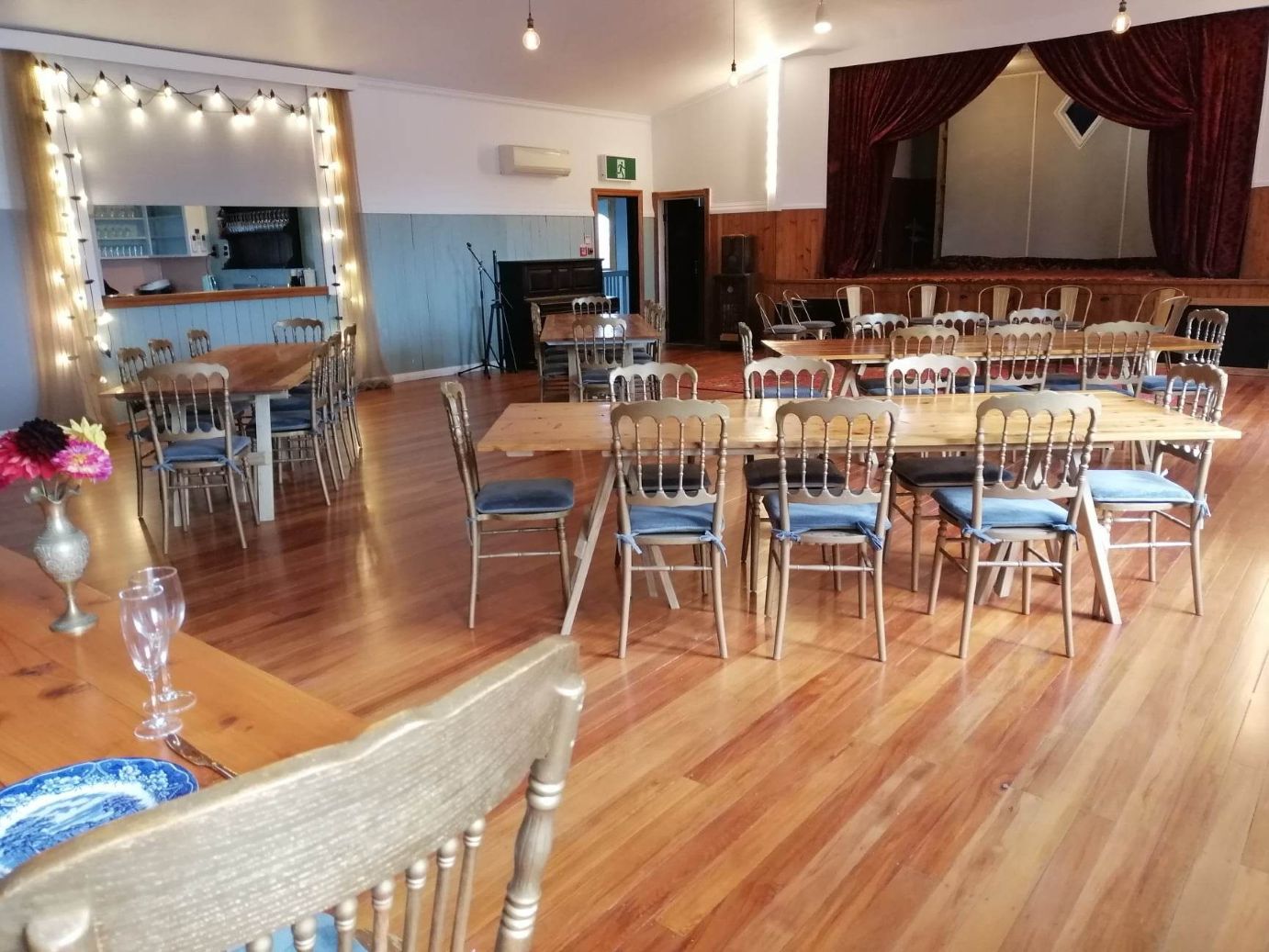 Tables and chairs set up for a special occasion function in Rosebrooke hall